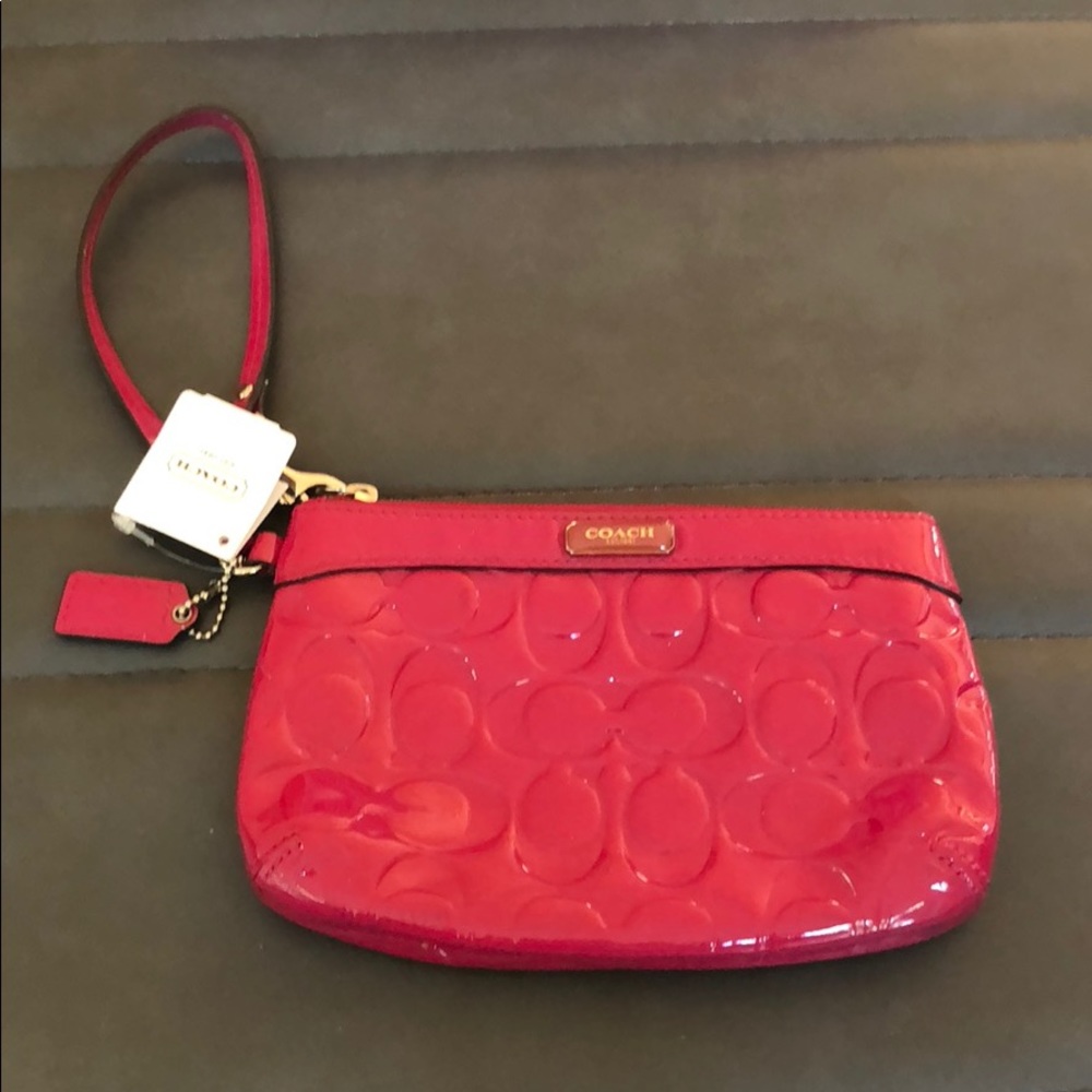 Coach hot pink wristlet